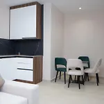 White Arena Apartment